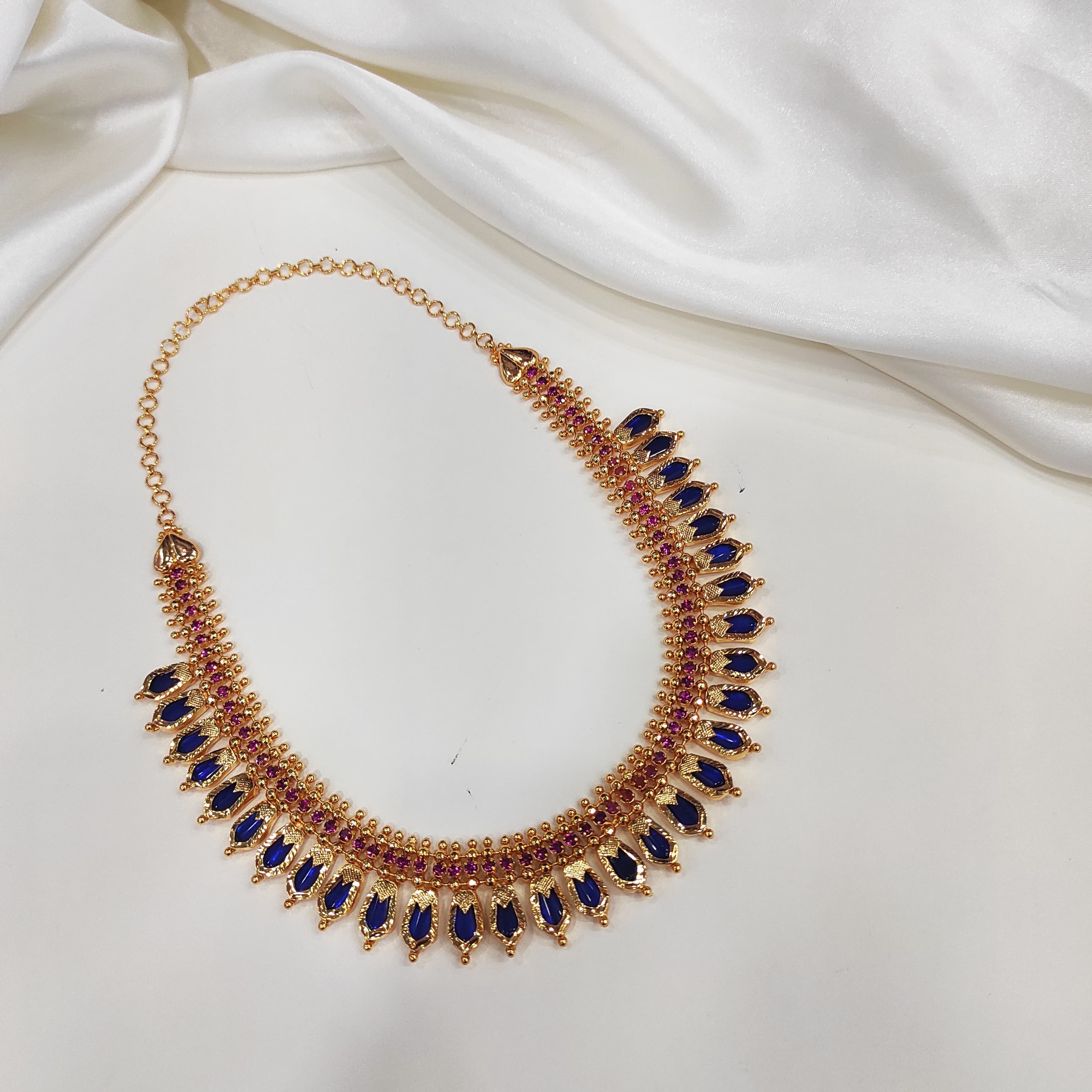 Gold plated nagapadam blue with ruby stone necklace 30 pettels