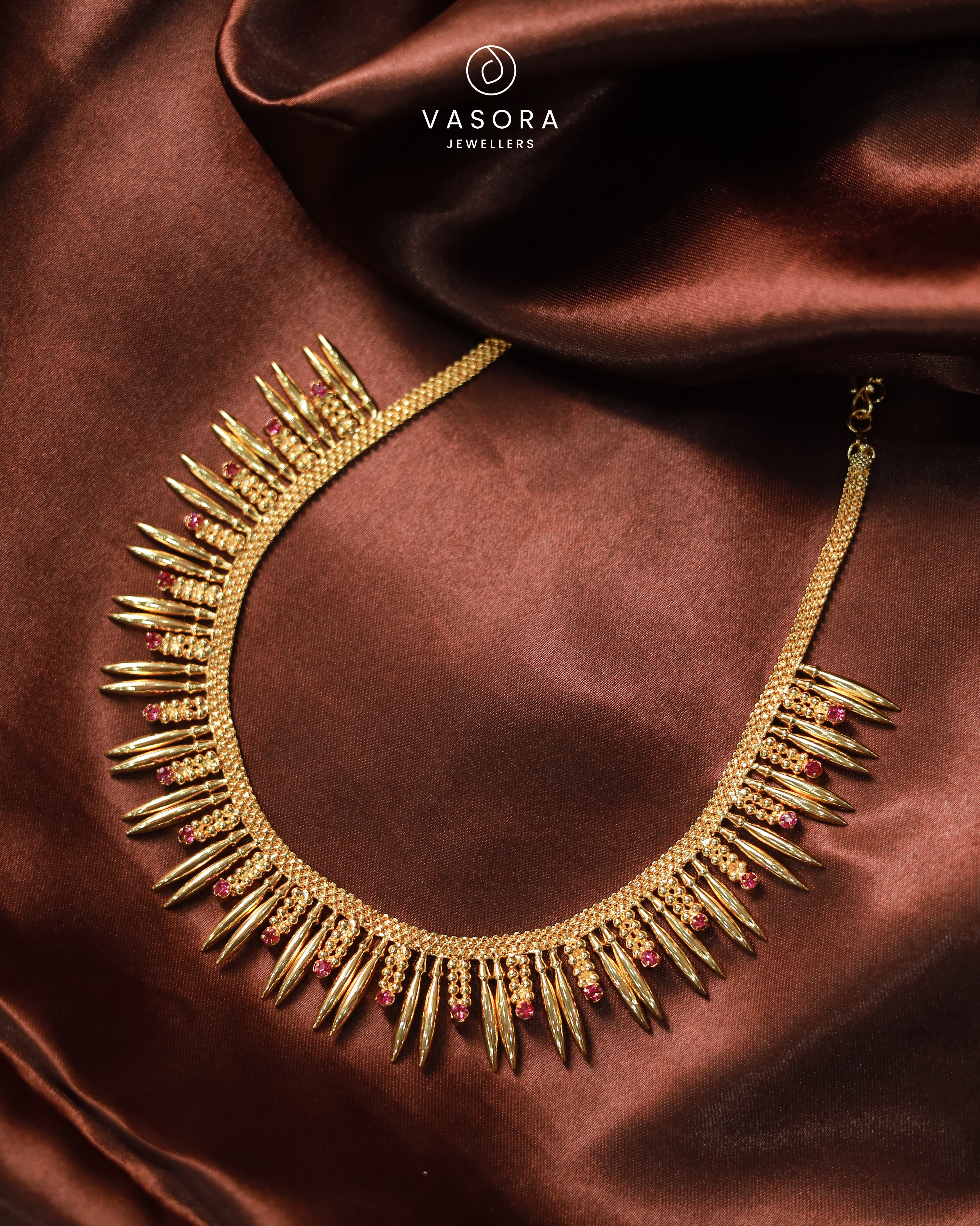 Gold Plated Pichimottu Necklace with Pink Stone Drops