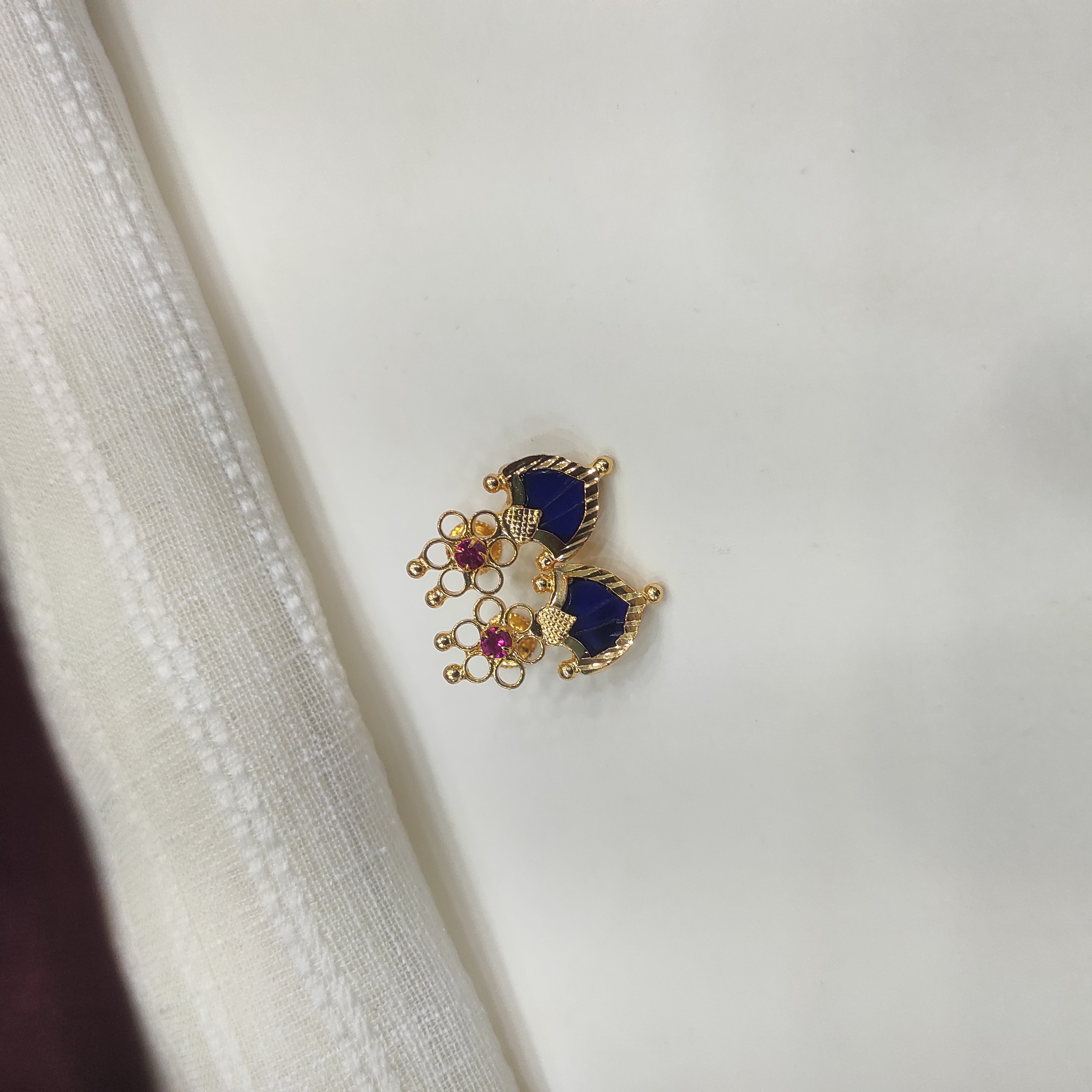 Gold plated Palakka flower blue stud