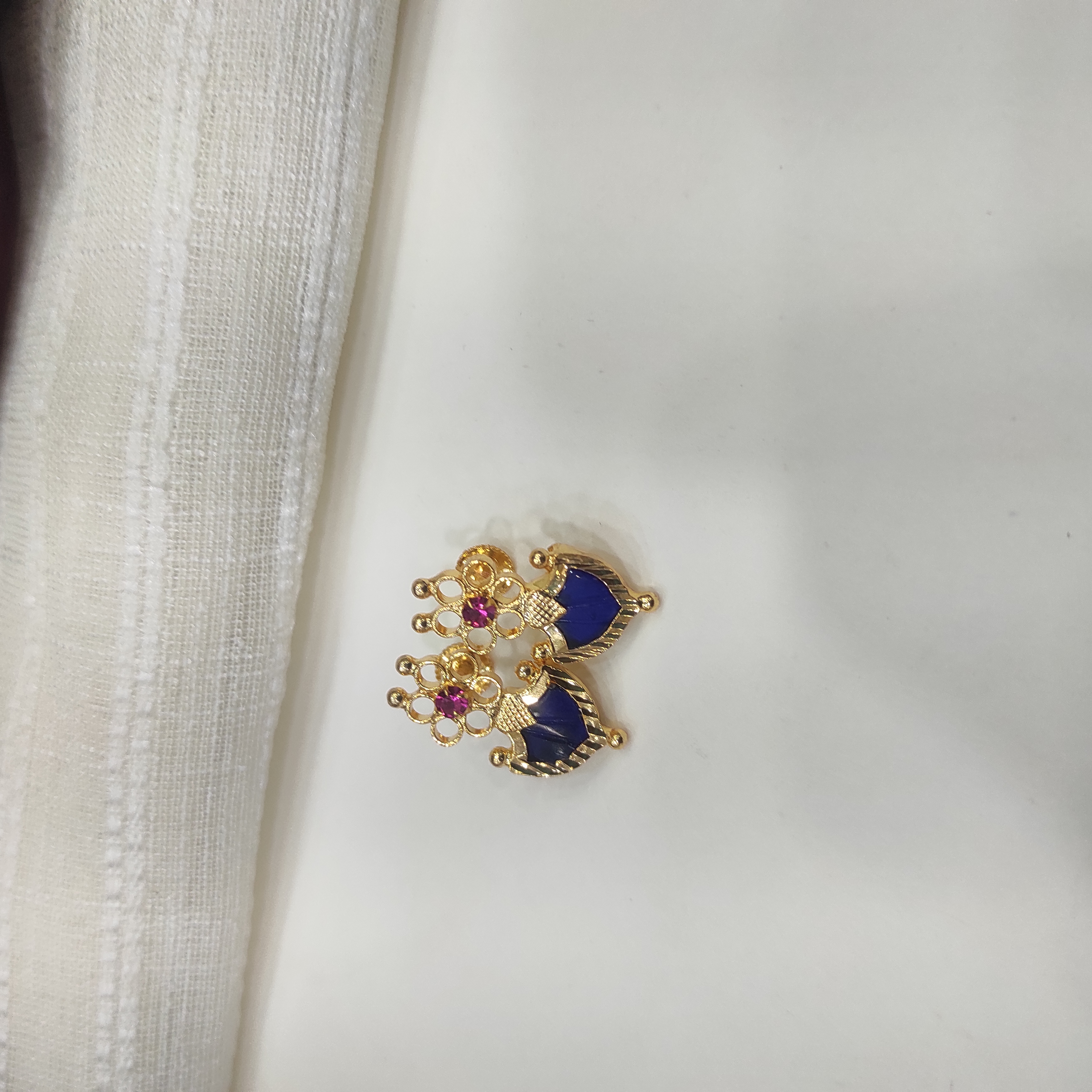 Gold plated Palakka flower blue stud