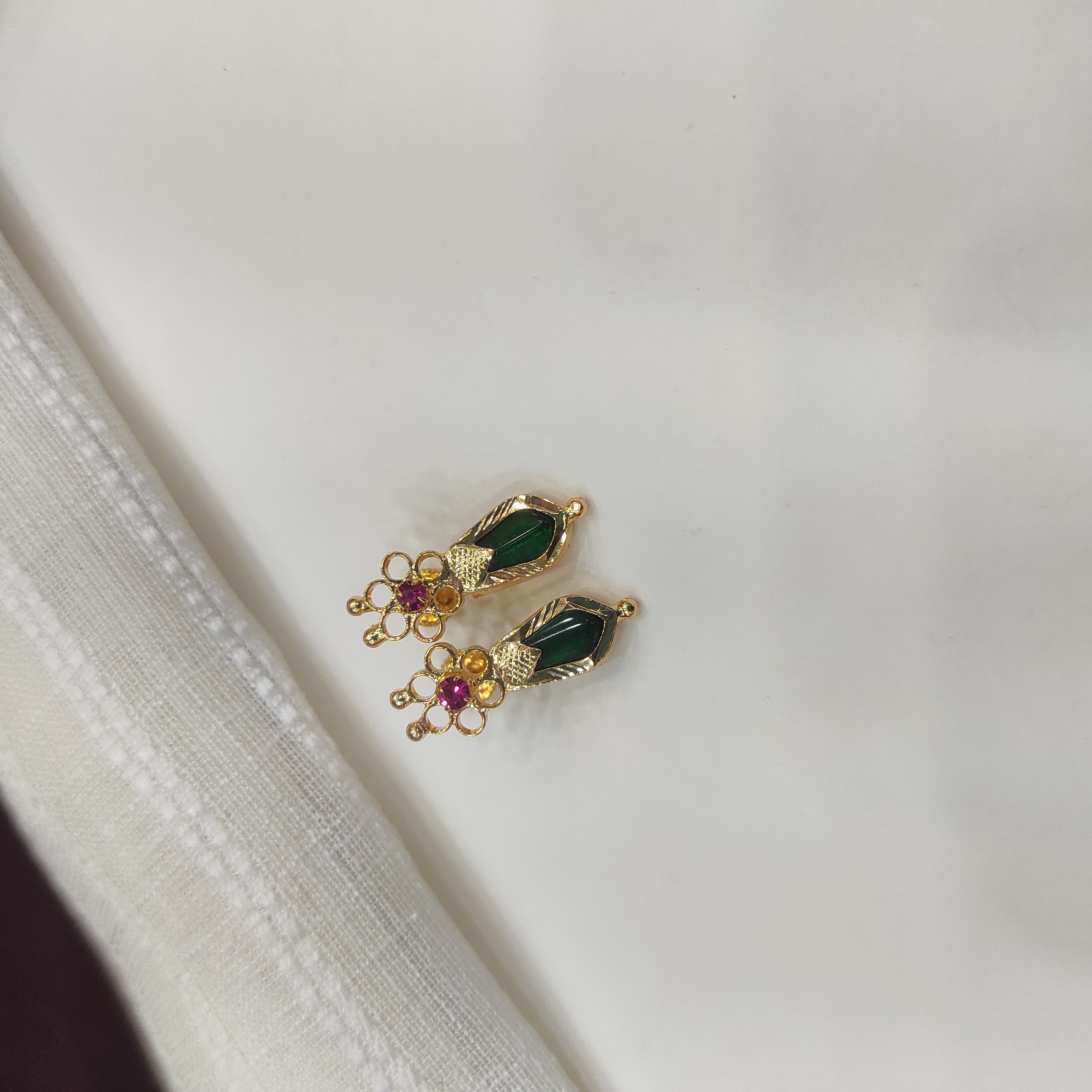 Gold plated nagapadam flower green stud