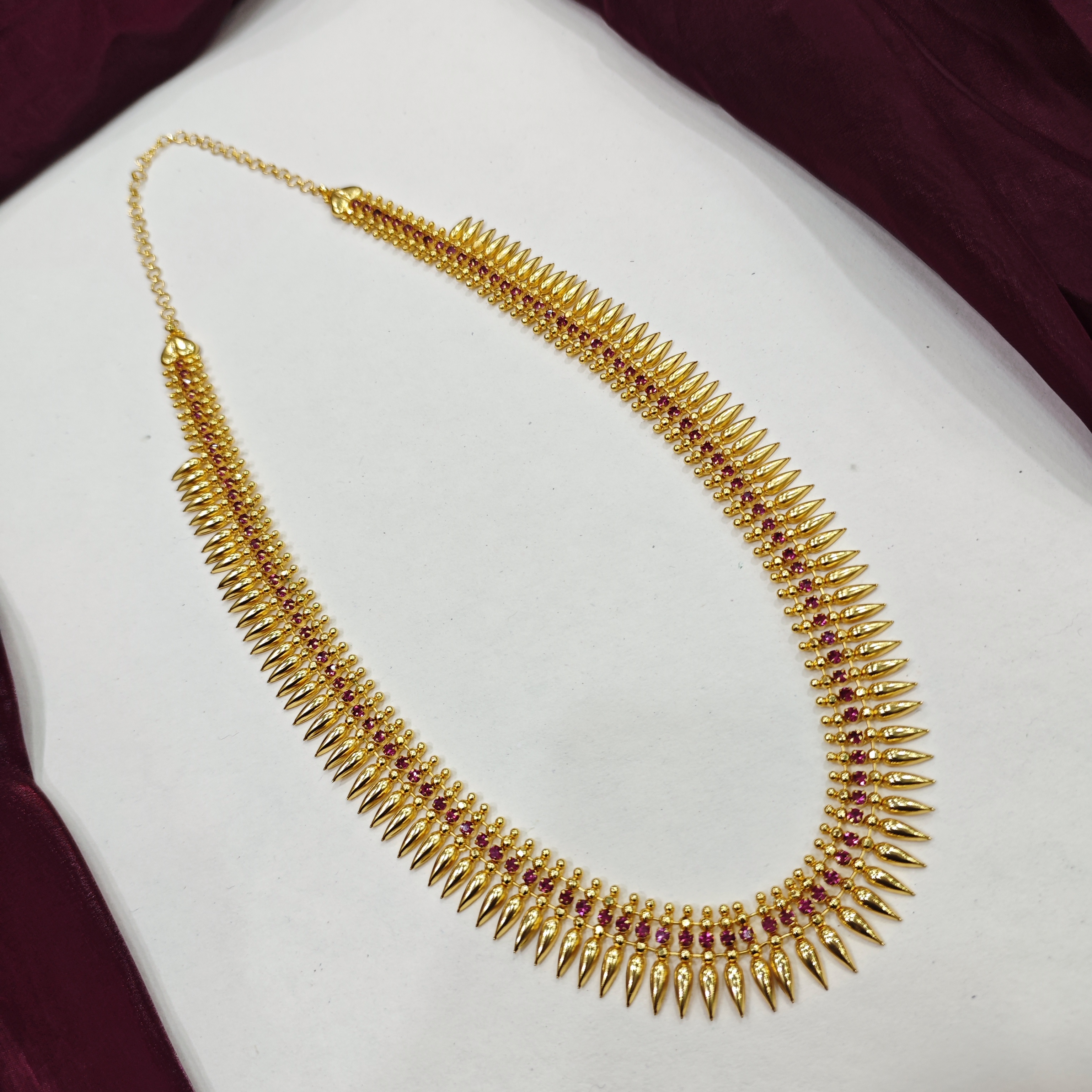 Gold plated mullamottu haram with ruby stone