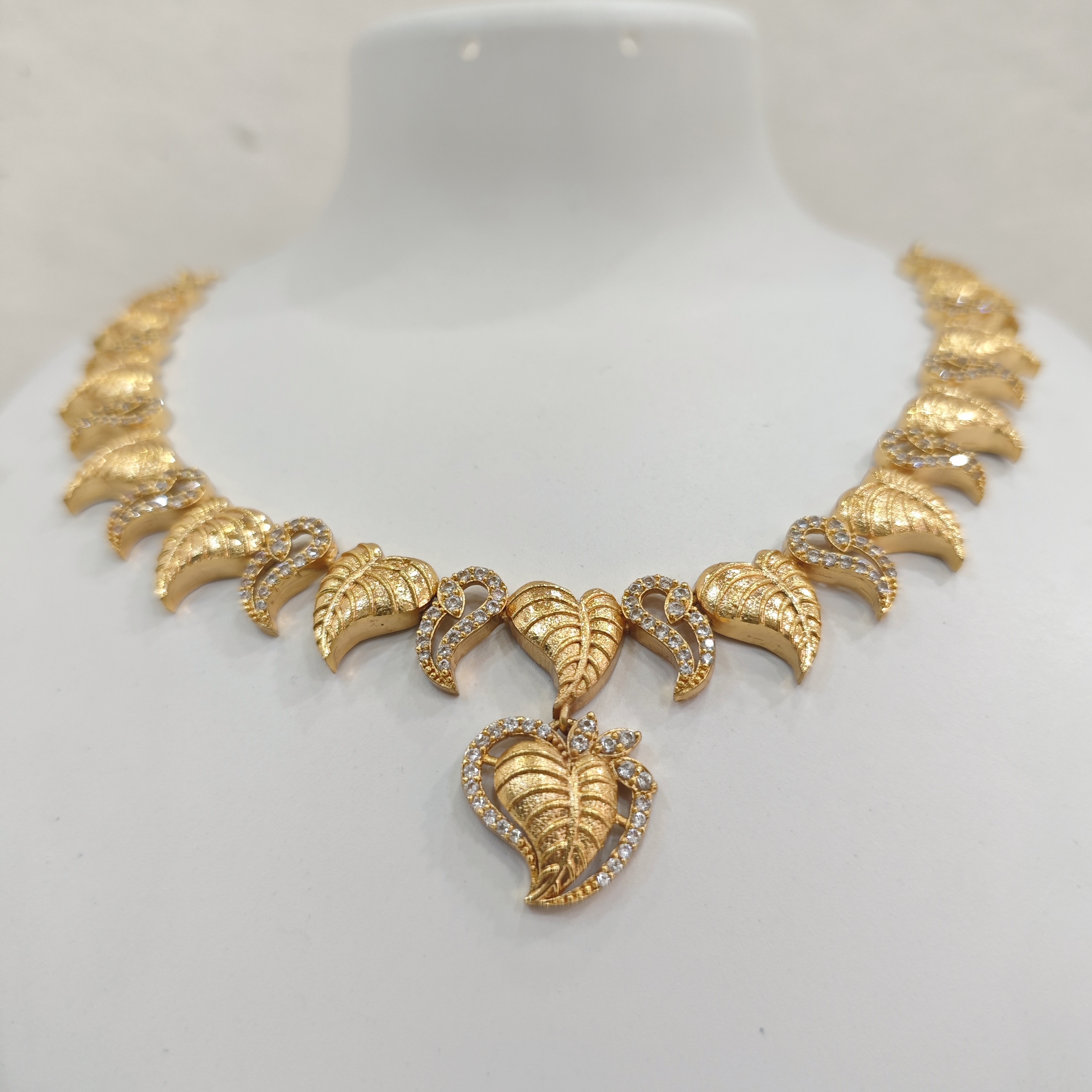 Gold-Plated Leaf Necklace Set with White Stones