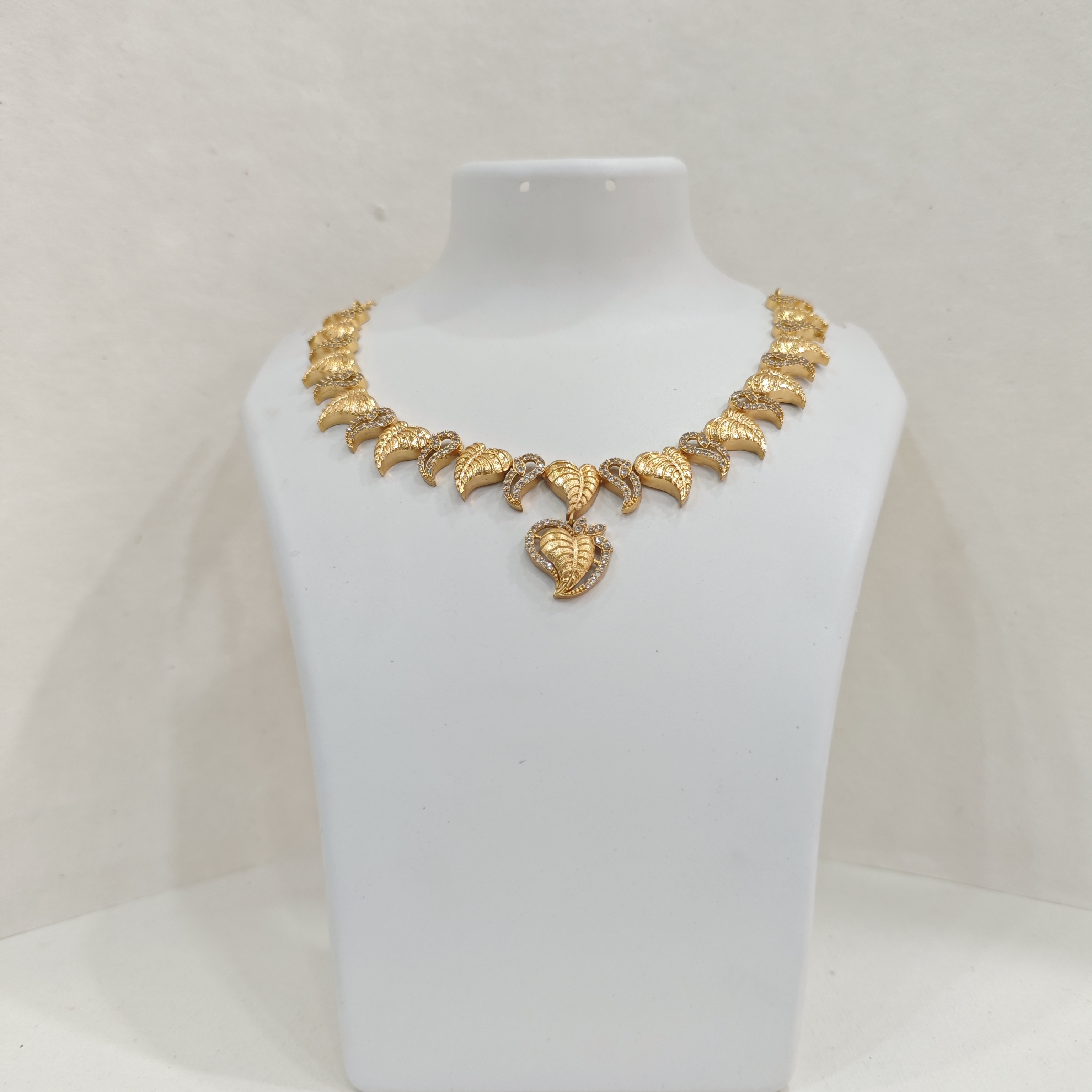 Gold-Plated Leaf Necklace Set with White Stones