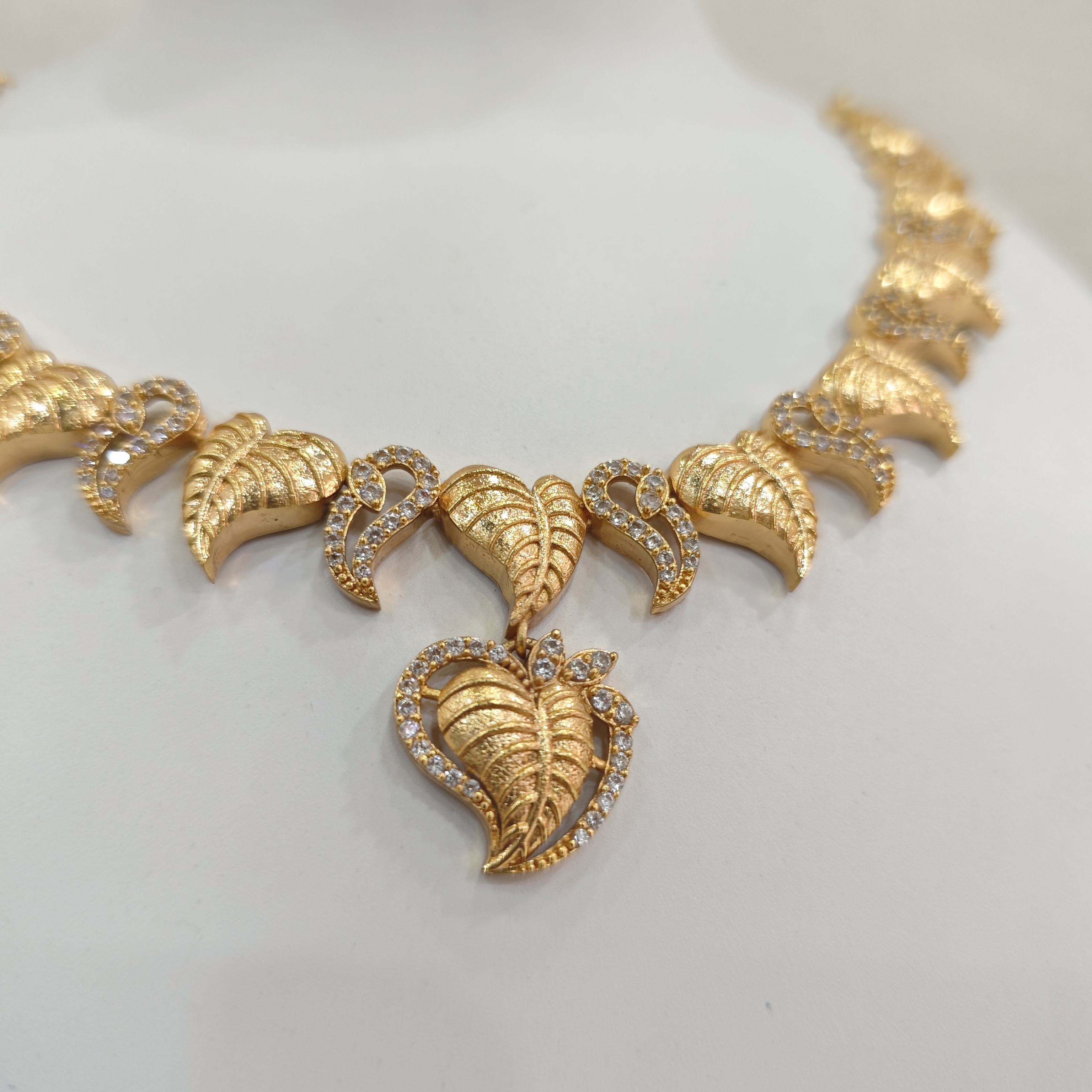 Gold-Plated Leaf Necklace Set with White Stones