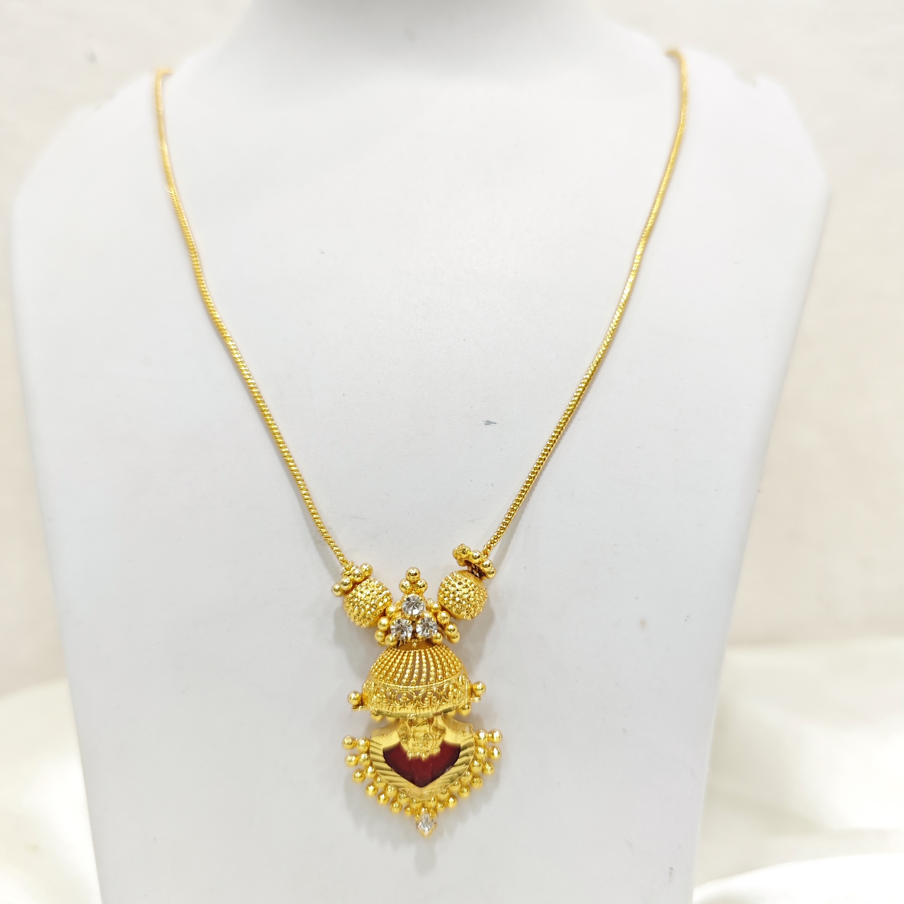 Traditional Gold-Plated Temple Design Pendant with Red Stone