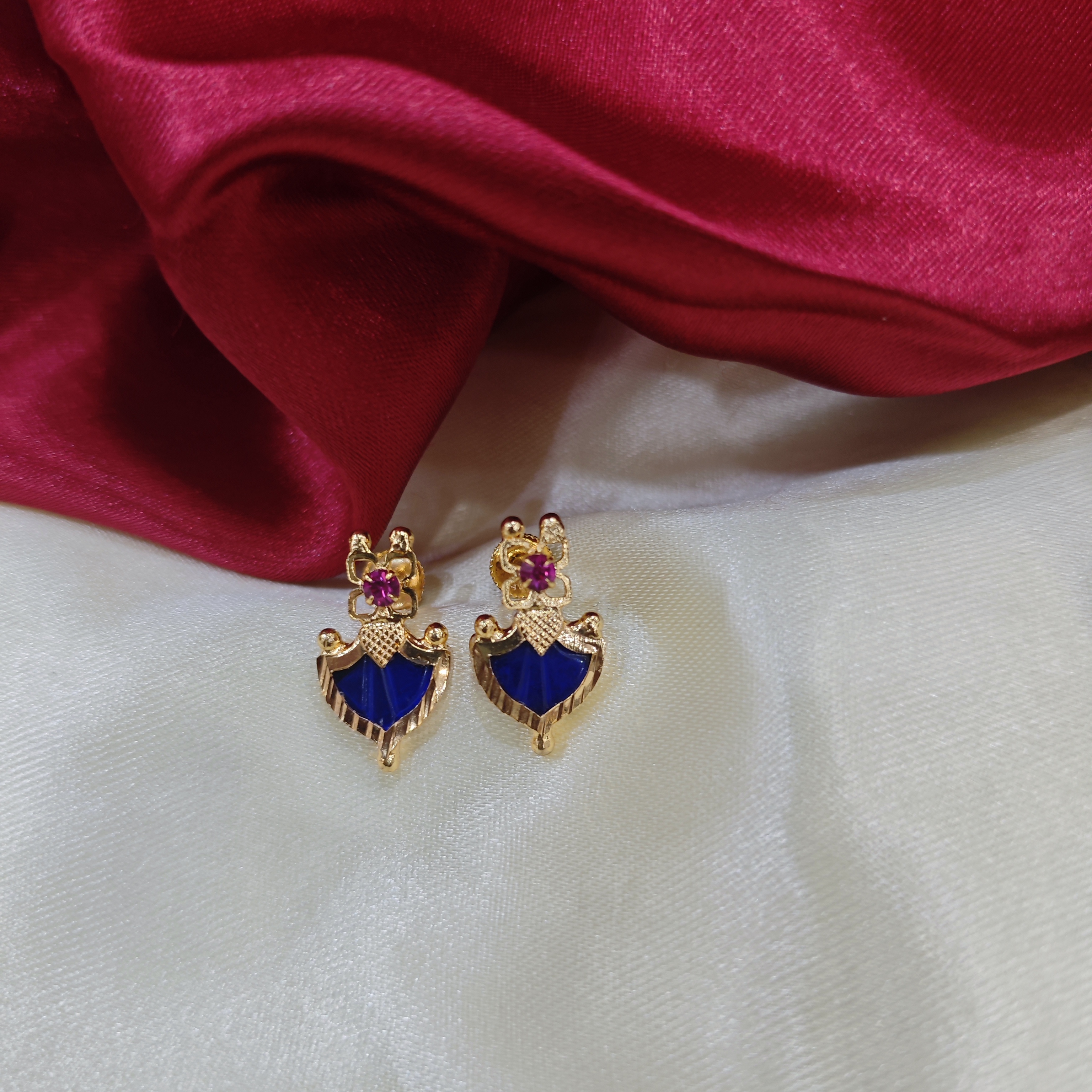 Gold plated palakka blue stud with ruby stone 