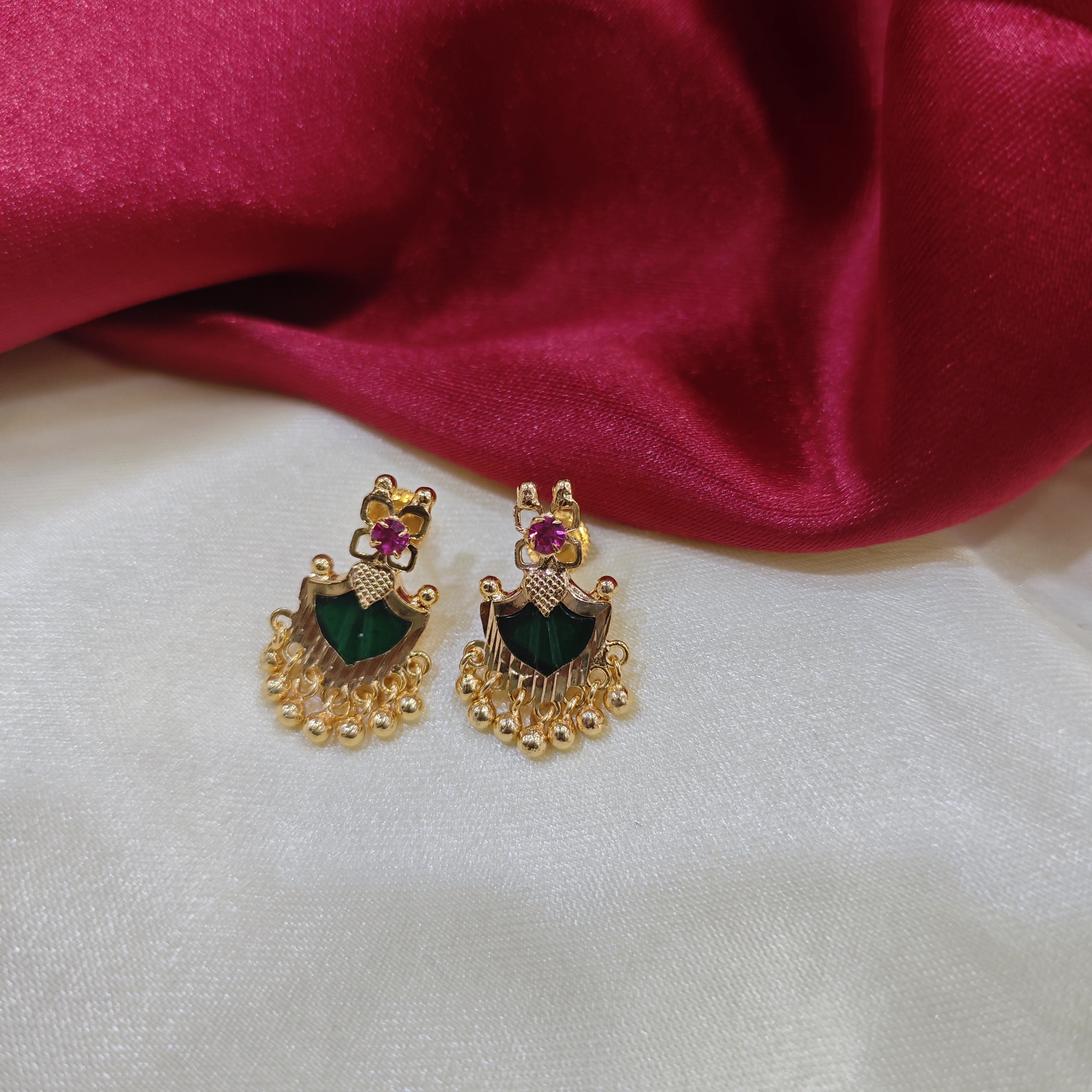Gold plated palakka green muthadal stud with ruby stone 