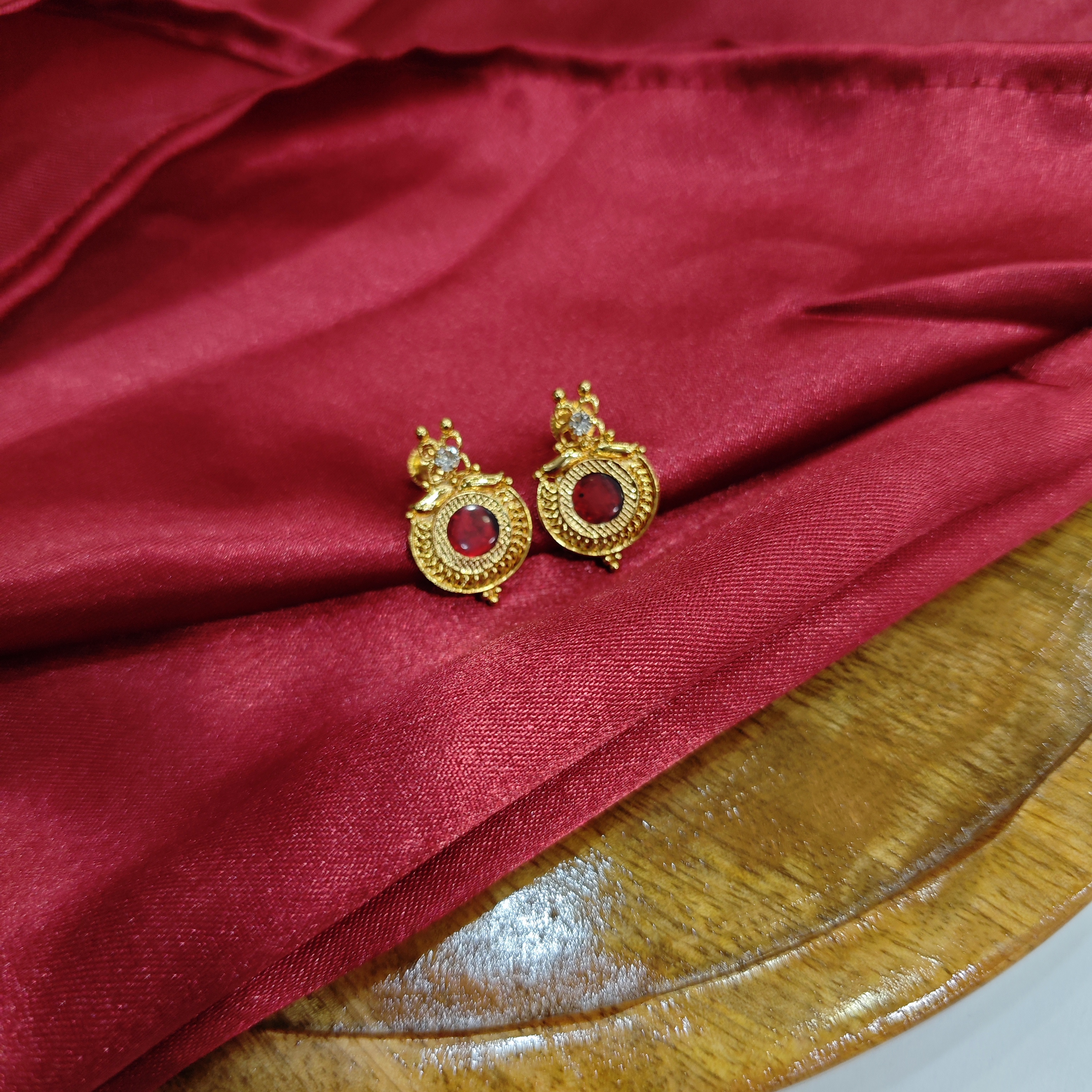 Gold plated round Red palakka fancy work
