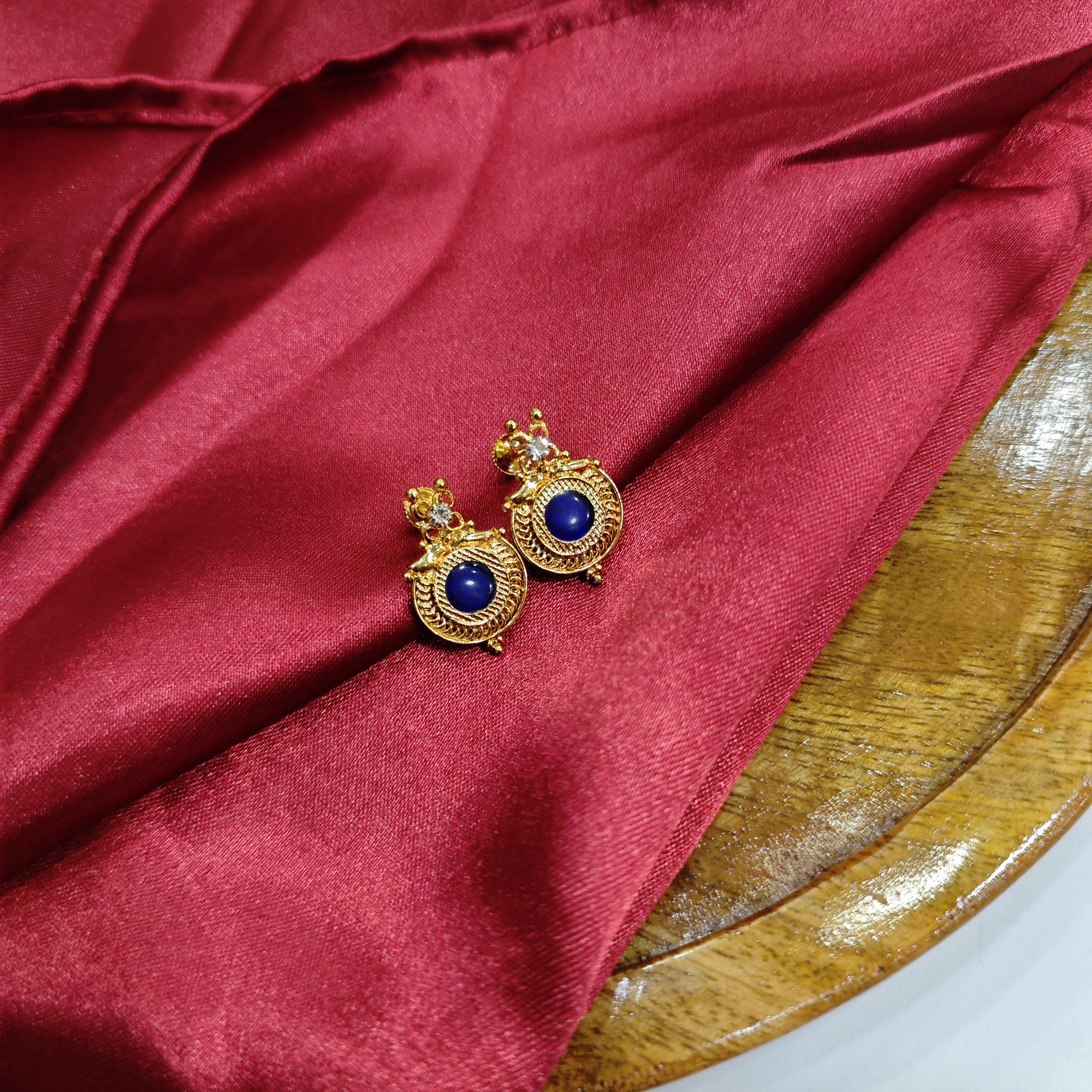 Gold plated round blue palakka fancy work