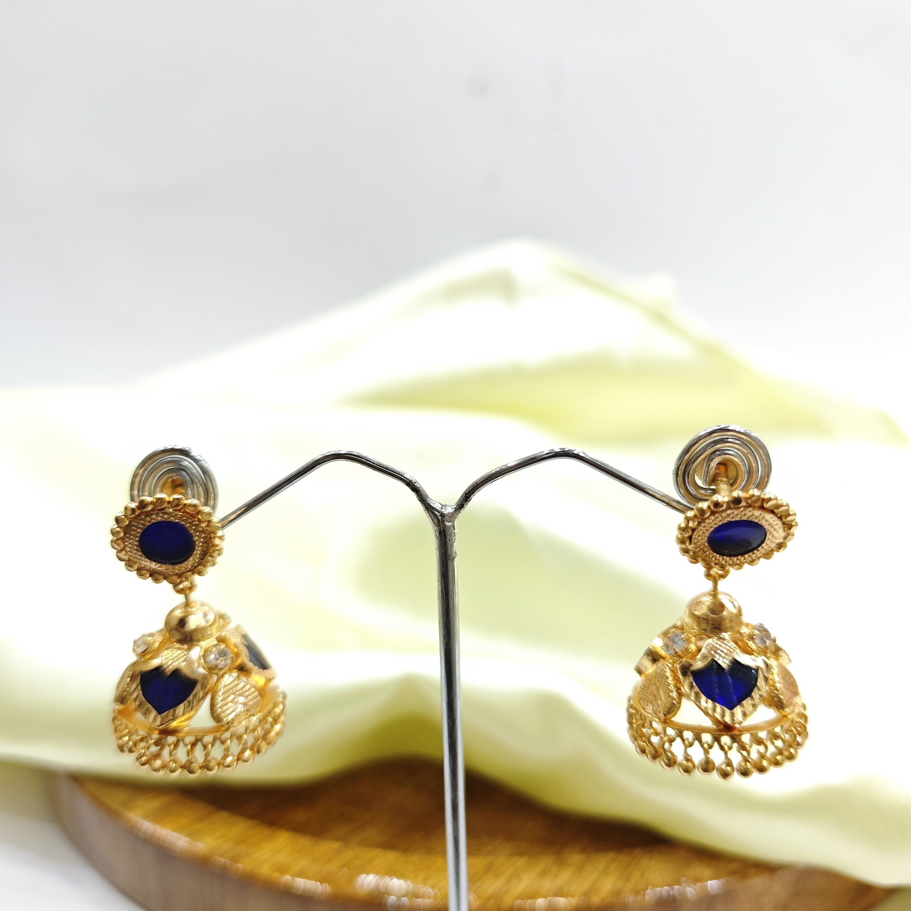 Vasora Gold Plated Palakka blue 3 Petals Jhumka Earrings