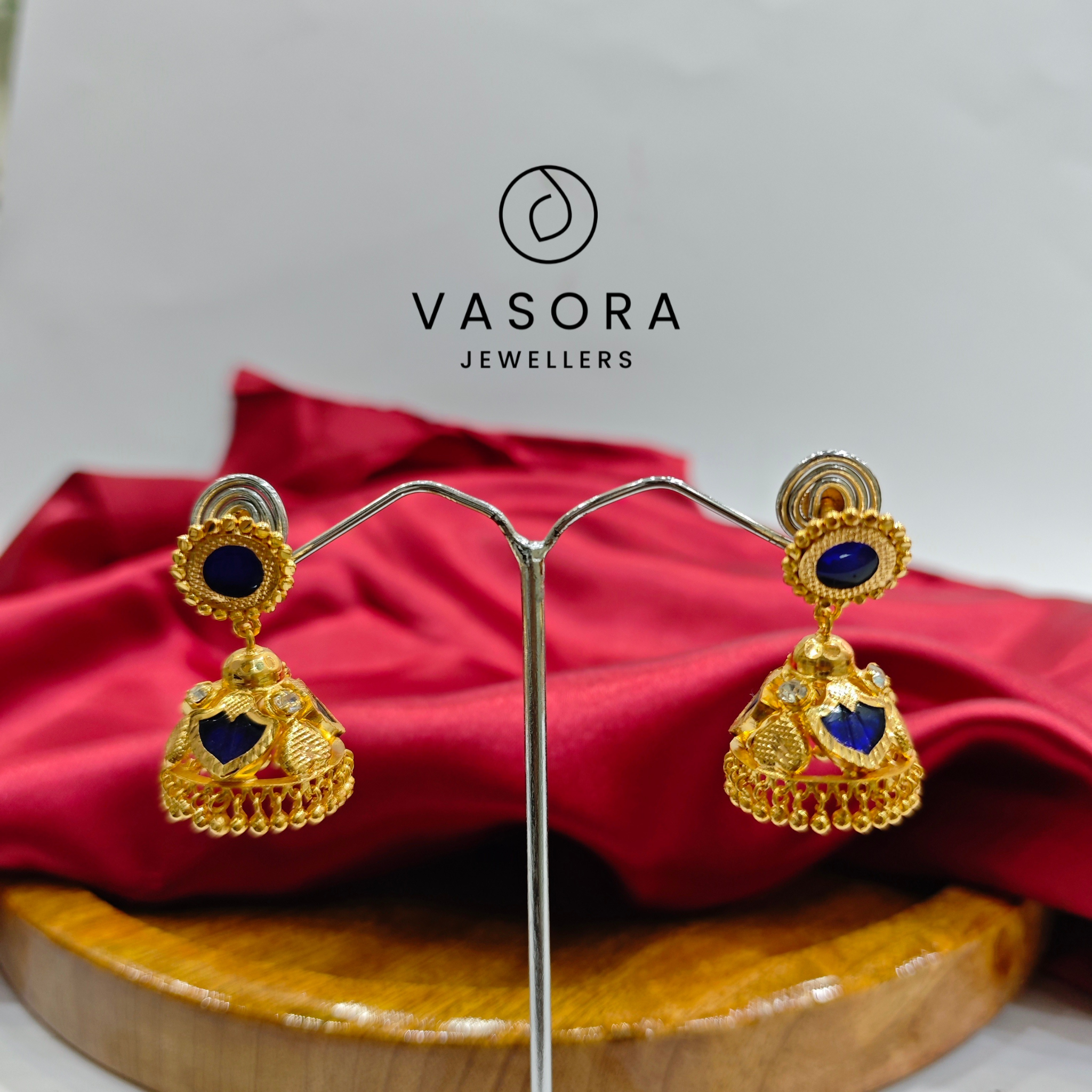 Vasora Gold Plated Palakka blue 3 Petals Jhumka Earrings